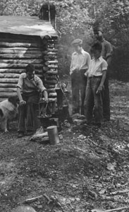 Vernon - Bill H_ - Frank H_, Leathers M_ Cooking at cabin before porch was built