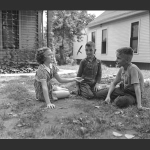 Group of kids playing Mumbly-peg Kathleen H_ Stanton Boys