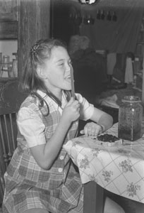Bettie H_ licking jam off spoon - Thanksgiving vist