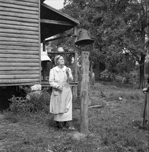 Grannie J_ ringing farm bell